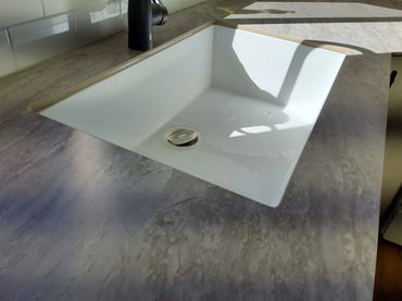 Thinscape countertop with composite sink