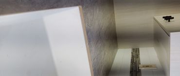 Thinscape counter top, composite sink, and back slash.