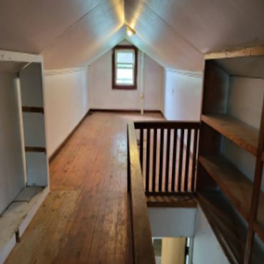 Floored and finished upper level for more space and storage