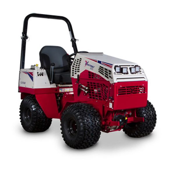 Compact red and white utility vehicle with large tires and a single seat.