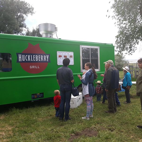 Green Huckleberry Grill food truck with customers. Best food truck in Salt Lake City.