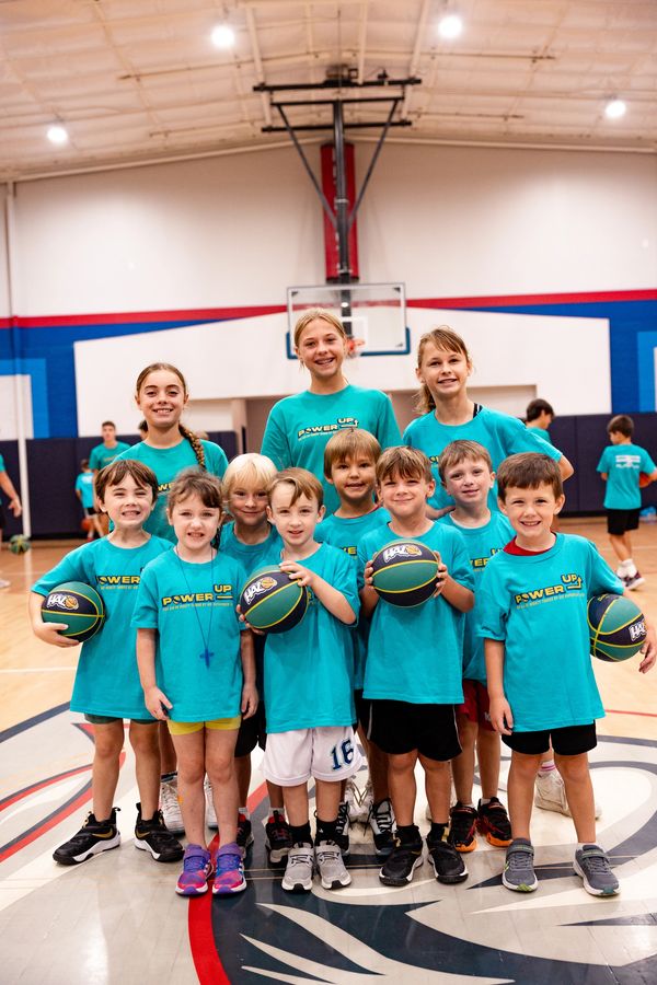Kids having fun at basketball camp