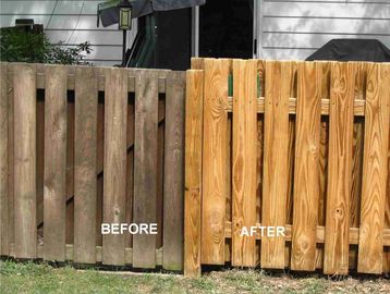 Comparison of a wooden fence before and after cleaning or treatment.