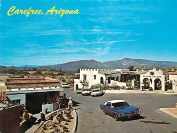 View of Carefree, Arizona with a vintage car and desert landscape.