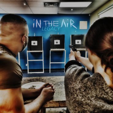 In The Air Legacy Knife and Axe Throwing Guild and leagues Ottawa bbgun shooting near me women bar