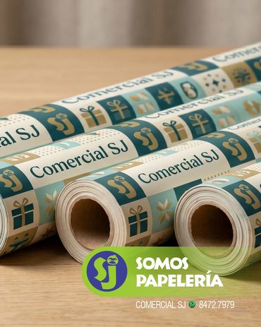 Multiple premium gift wrap rolls with colorful patterns and designs, featuring the 'Somos Papelería'