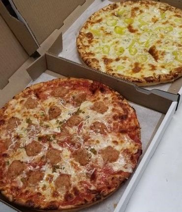 pizzas in boxes