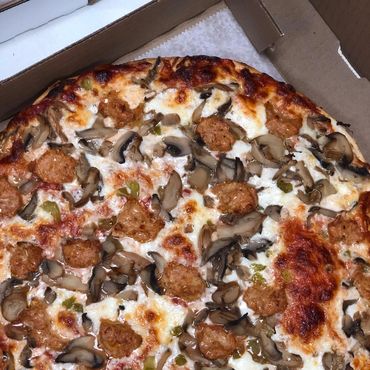 Mushroom and sausage pizza