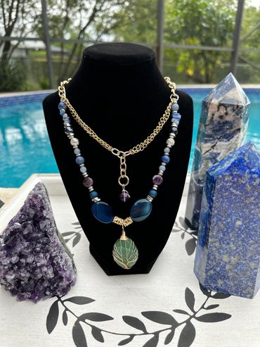 Chic necklace with blue agate, amethyst beads, and a green chalcedony pendant.