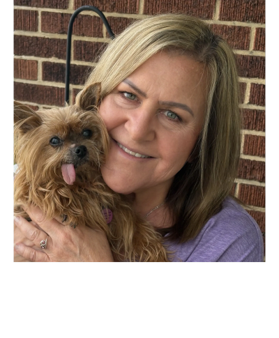 Michelle Hines Animal Communicator holding Pippa the Yorkie