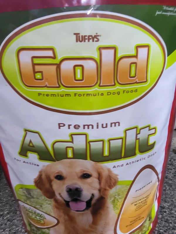 Package of Tuffy's Gold Premium Formula dog food for adult dogs.