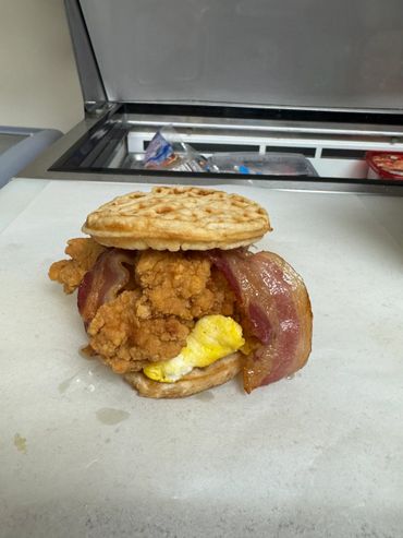 Chicken and waffle sandwich with Bacon and egg