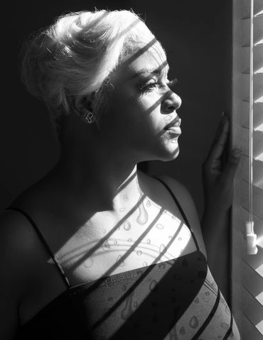 Editorial-style portrait with dramatic lighting