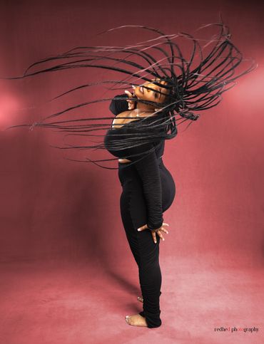 Editorial portrait capturing dramatic hair movement — RedHed Photography, Tallahassee FL