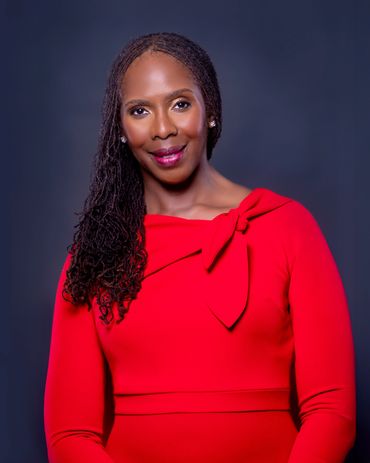 Professional branding headshot in bold red styling with dramatic studio lighting — RedHed Photograph