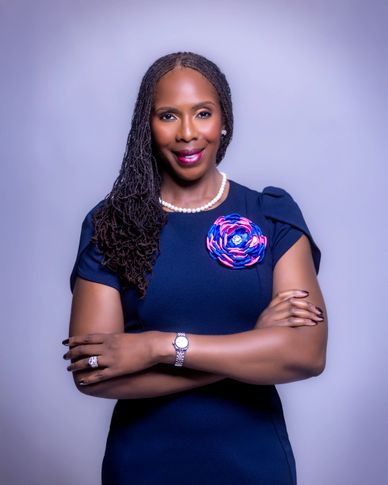 Corporate headshot of professional woman with soft gradient backdrop — RedHed Photography, Tallahass