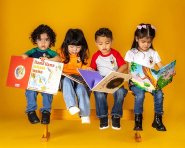 Commercial lifestyle brand photography of children reading books in academy uniforms educational cam