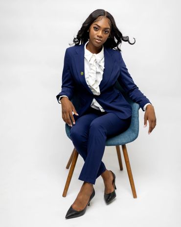 Commercial executive branding portrait of professional woman in navy suit RedHed, Tallahassee FL