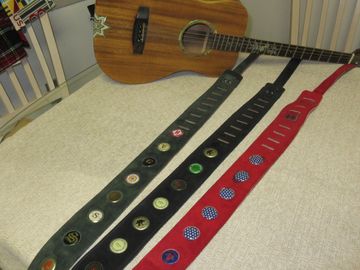 Guitar straps, with inset bottle caps, plain or stamped.  