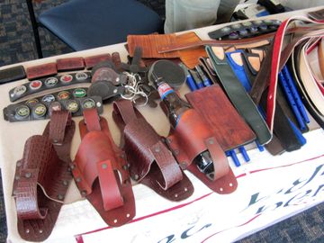 Leather pint glass and bottle holsters with belt loop.   Choice of colors and stamps or conchos. 
