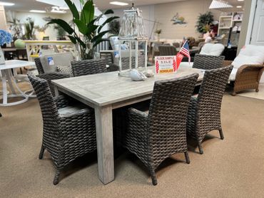 Shelburn Teak Table/ Universal Wicker Dining Arm Chairs