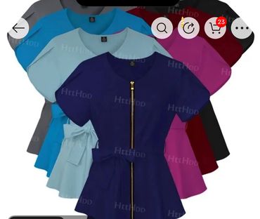 Collection of colorful women's tops with front zippers and waist ties.