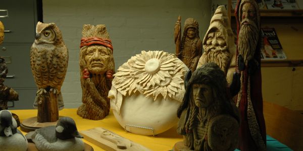 Various carvings and figures in soft lighting picture 2.