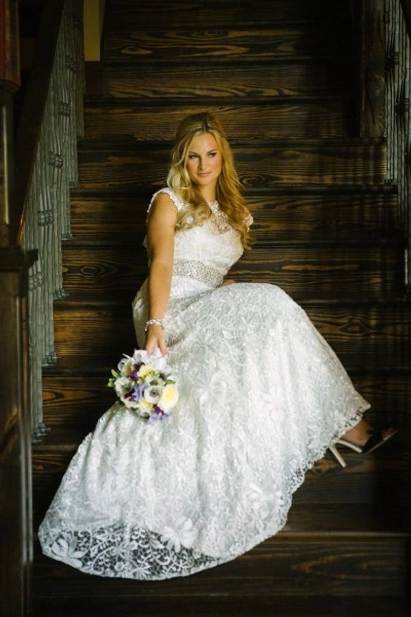 bride sitting on steps