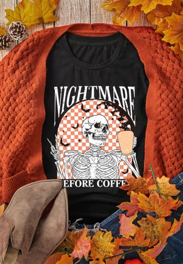 Black shirt with skeleton and coffee design, autumn-themed outfit.