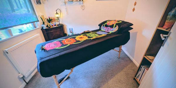 A photo of our therapy couch in our therapy room