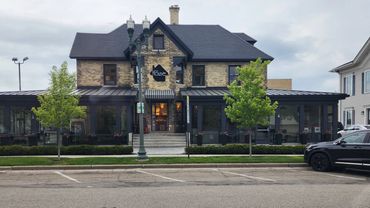 Coffee cafe and retail shop combined into an inviting space for patrons to shop and start their day.