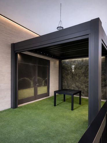 Custom aluminum pergola installed over backyard patio.