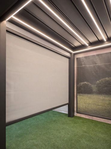 Aluminum pergola with motorized ZIP screen for shade and privacy.