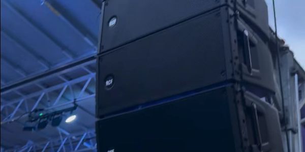 Professional audio equipment staged and set up for a live event