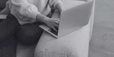 Social media marketing packages featuring person working on a laptop.