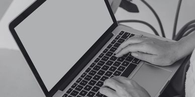 Social media marketing services featuring person working on a laptop.