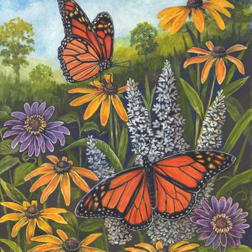 Two monarch butterflies on colorful flowers in a bright garden.