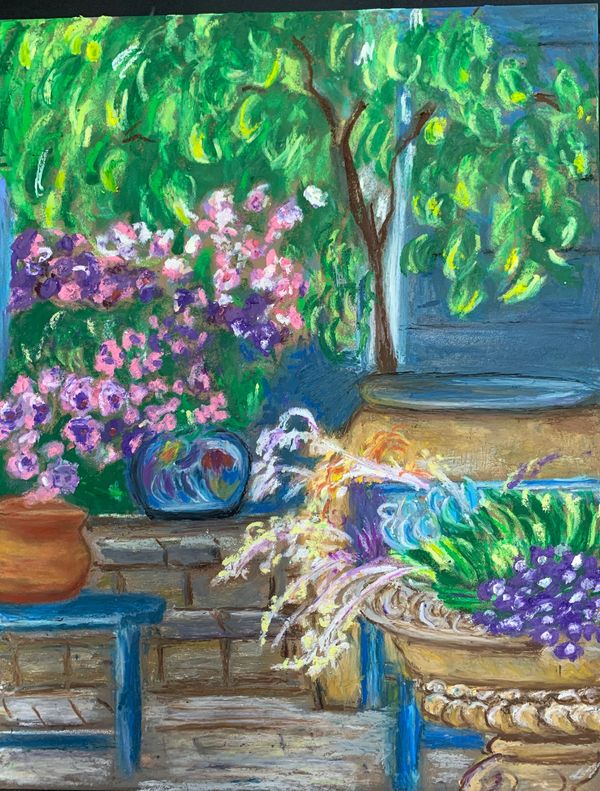 Front porch with pots and flowering plants