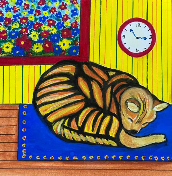 Cat sleeping on bright blue rug