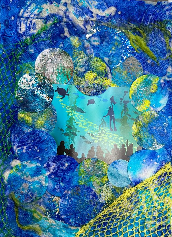 Collage in blue, yellow, green with scuba divers photo in center surrounded by painted circles and y