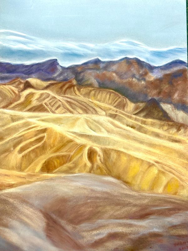 Mountains and stark dessert and canyons
