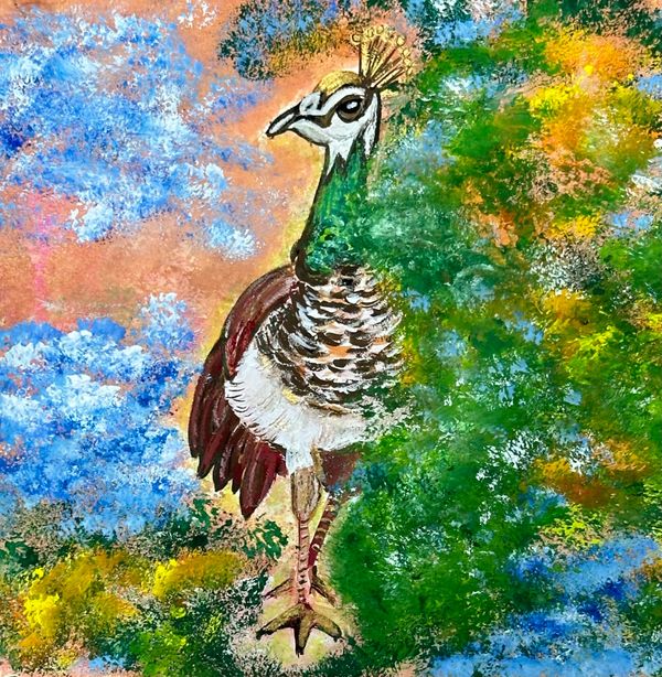 Peahen slightly hidden by foliage