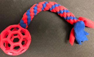 red and blue tug with ball