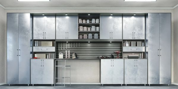 Heavy-duty industrial workshop cabinetry with CNC-cut precision and metallic finish, custom-designed for professional garages by QTC Cabinet Solutions