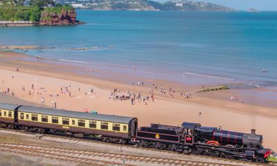 Goodrington sands beach with steam train