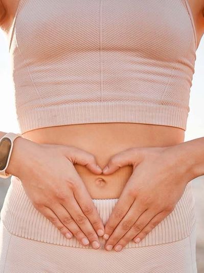 a woman touching her belly