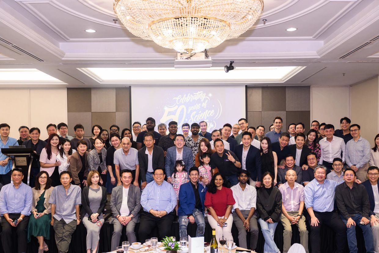 Group photo celebrating 50 years of SII excellent service.