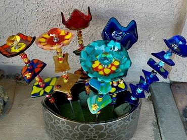 Multiple examples of bling for your flower pots.