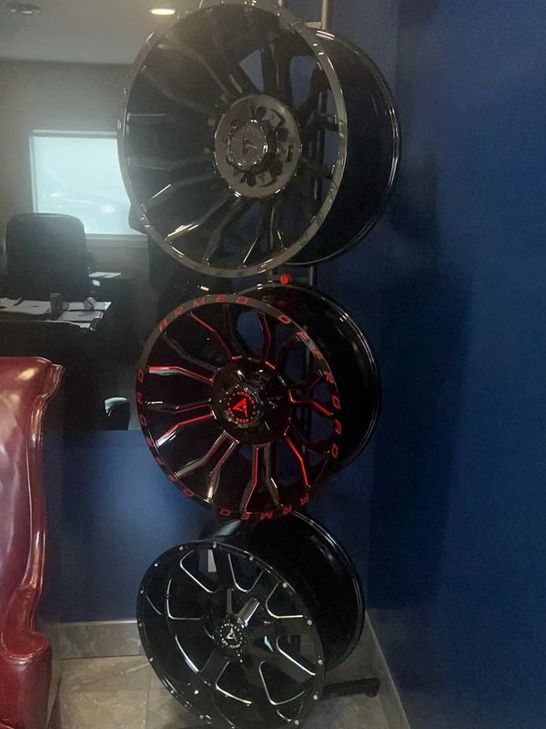 Picture of rims on a rack