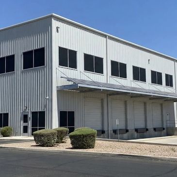 Exterior of a modern industrial warehouse building.